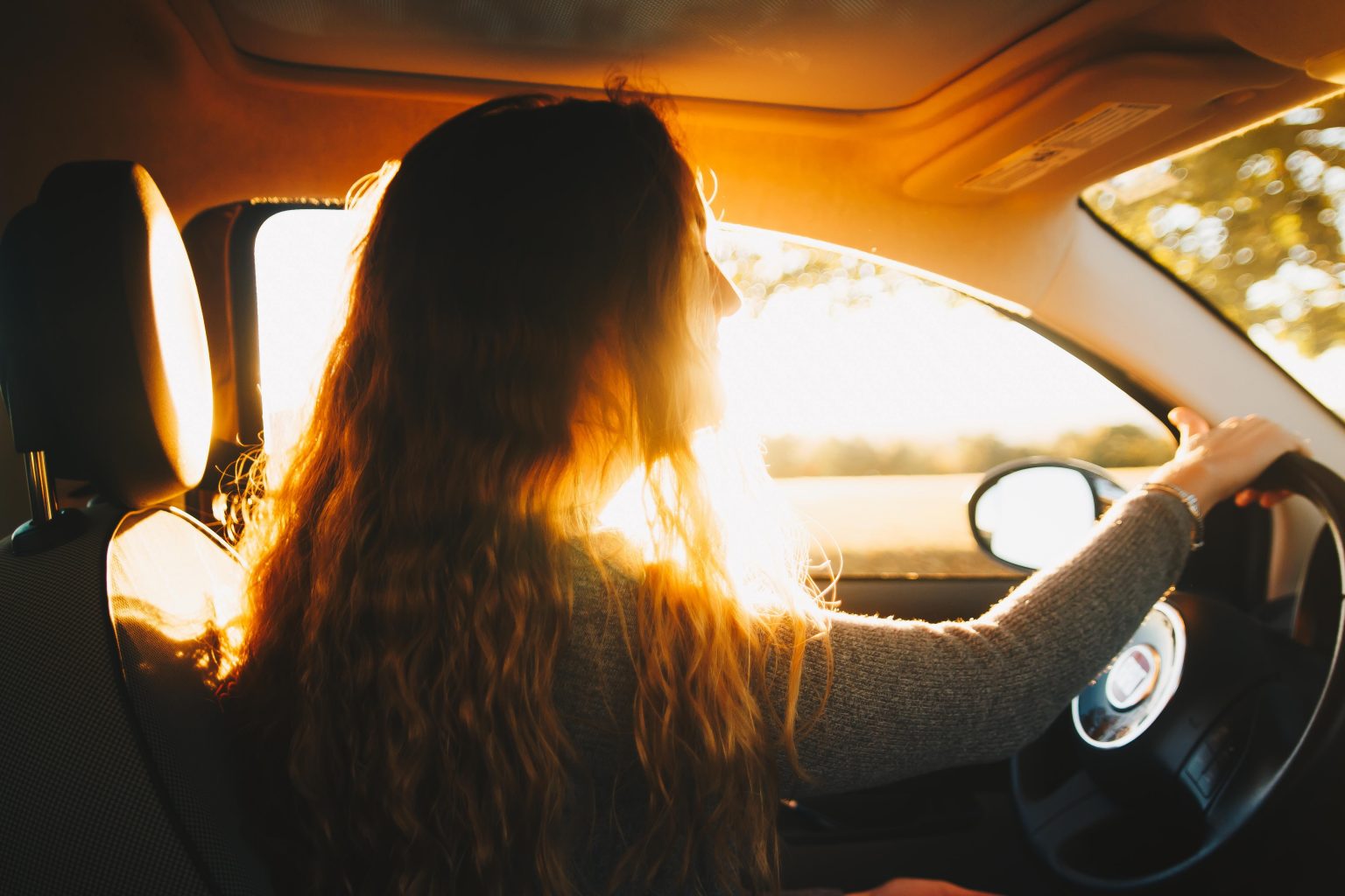 teenager driving a car